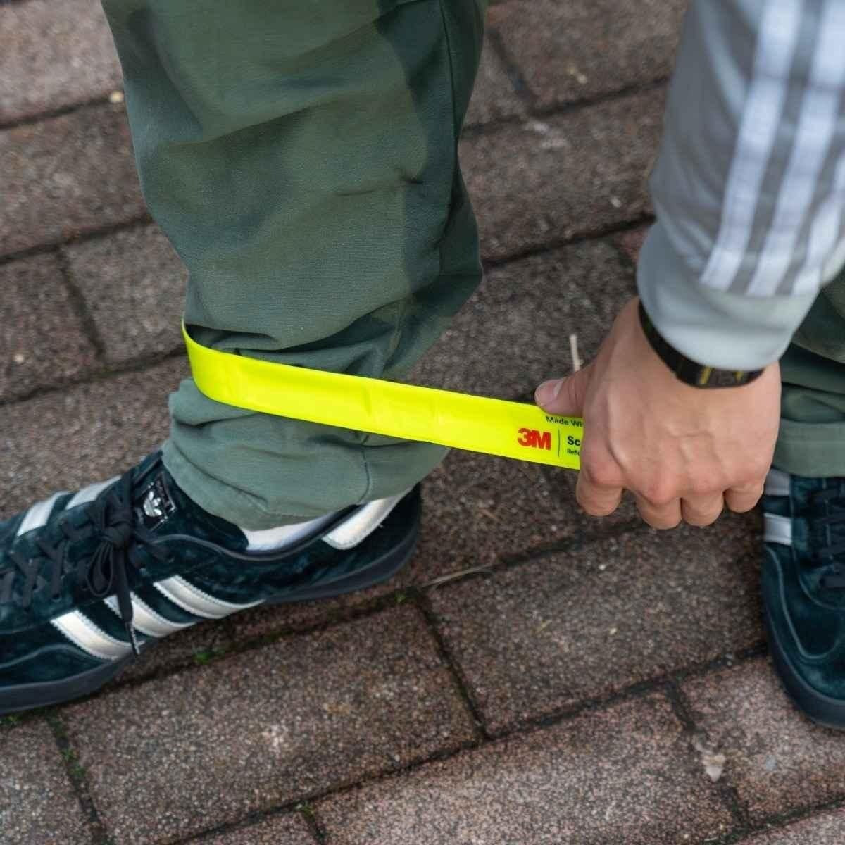 3M REFLECTOR ANKLE BAND (YELLOW/RED LOGO) – BICYCLE STUDIO MOVEMENT